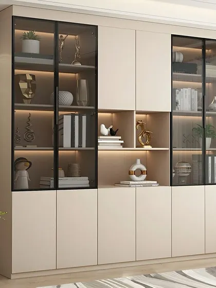 A contemporary crockery unit in a light beige finish with smoked glass doors. It offers a mix of display shelves and concealed storage for a clean, organized look.