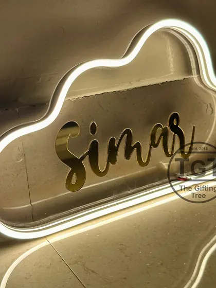 A side view highlighting the sleek profile of the cloud neon sign. It's a stylish and modern piece of wall decor.