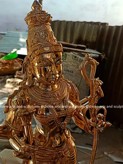 A close-up of a 25-inch Kamakshi sculpture, freshly polished. This view shows the incredible detail and lustrous finish of the bronze, reflecting the light and the devotion poured into its creation.