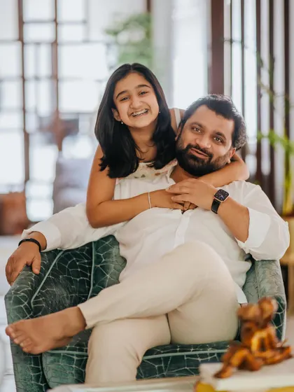 A beautiful, tender moment between a father and daughter. The comfort of being at home allows for these natural and heartfelt interactions to unfold in front of my camera.