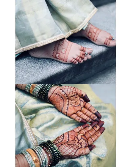 A closer look at the delicate mehendi for a baby shower. The design includes simple patterns on the feet and a beautiful floral and geometric pattern on the palms.
