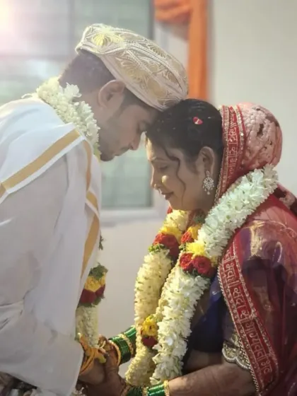 A tender moment from Snehal and Dinesh's wedding, where they connect in a moment of quiet reflection. This image captures the deep, unspoken bond that is nurtured through shared spiritual practices.