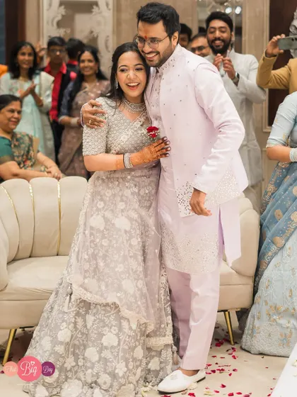 The pure joy of a "yes". This hug between Rajat and Rachita, with their happy family in the background, is what celebrations are all about.
