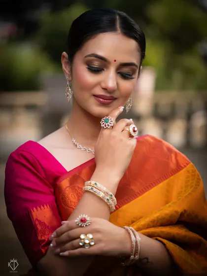 A close-up portrait focusing on the model's hands and jewelry, demonstrating my skill in capturing fine details for commercial clients.