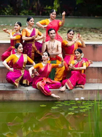 The entire cast of "Tyāgarāja Hṛt Sādana" in a beautiful composition by the water. This photo captures the harmony and spirit of our ensemble.