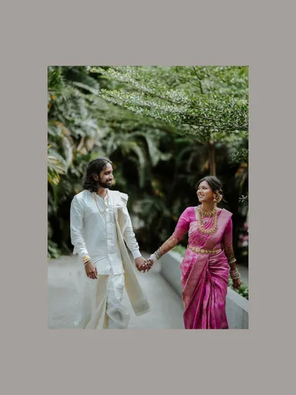 A beautiful portrait of the couple walking hand-in-hand after their wedding ceremony, ready to start their new life together.