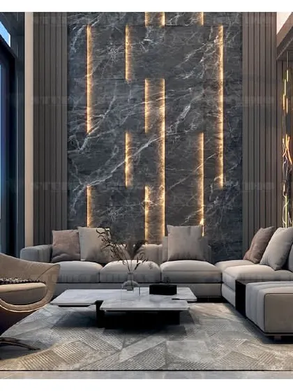 A lobby and dining area in Kirti Nagar, where dramatic, dark marble walls with integrated lighting create a moody and luxurious atmosphere.