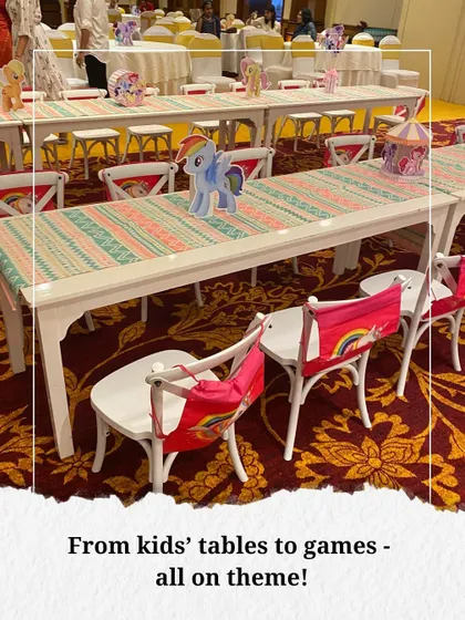 Even the seating was on-theme. We designed these custom kids' tables with colorful runners and pony-themed chairs, creating a special space for the little guests to dine and play.