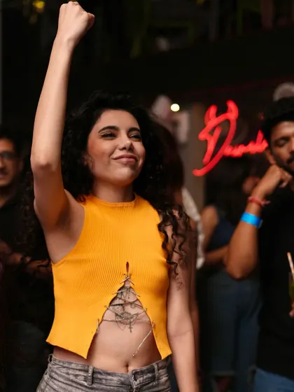 Hands up and ready for whatever the night brings.