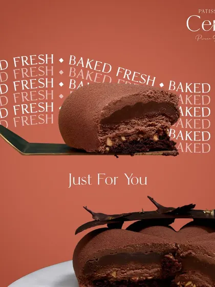 Baked fresh, just for you. This image, showing a perfect slice of my chocolate entremet, is a testament to my dedication to unmatched quality and refined taste.