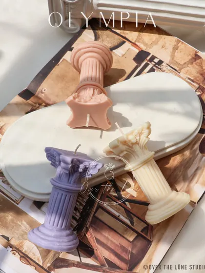 My broken pillar candles are a nod to ancient ruins. Available in various colors, they add a touch of romantic history to any setting.