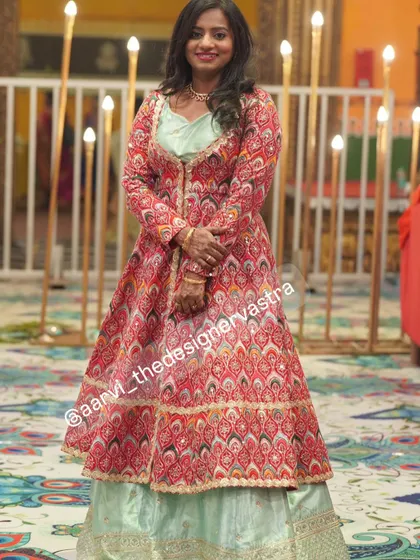 Our client Tharuna looking elegant and happy in her custom jacket lehenga.