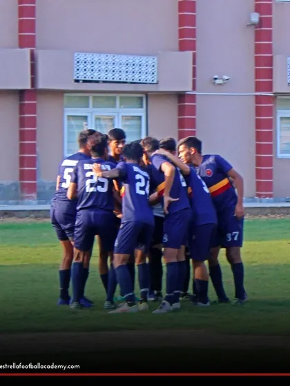 The pre-game huddle is where strategy is discussed and the team gets motivated. This moment of unity is crucial for a strong performance on the field.