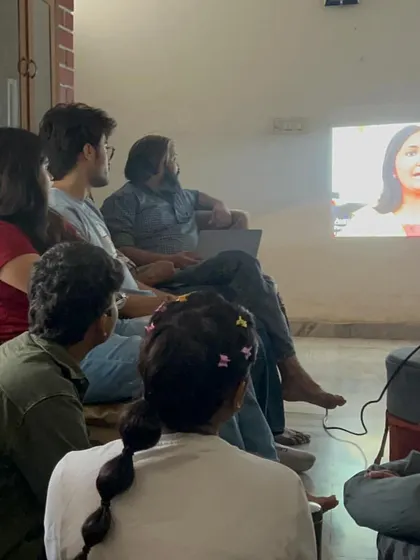 Fellows watch a training video together, learning from experts and analyzing different facilitation styles. This is part of our commitment to their continuous professional growth.