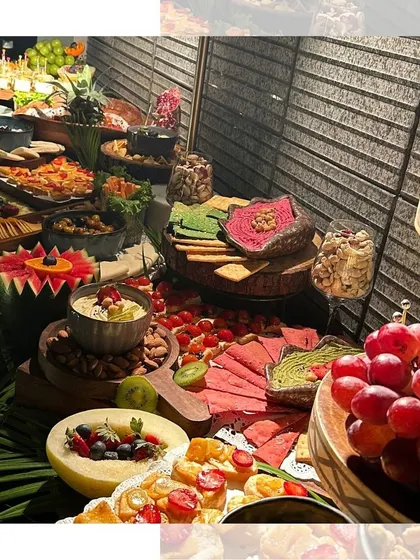 Another angle of our stunning grazing table, highlighting the different elevations and textures we use to create a visually dynamic and appealing spread.