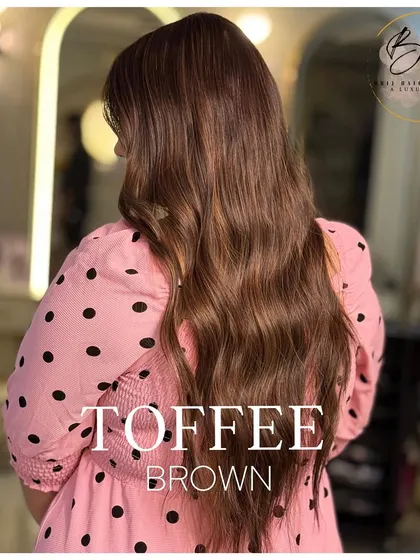 This toffee brown color is the sweetest indulgence for your hair. It’s a rich yet subtle shade that adds depth, dimension, and a touch of irresistible glamour.