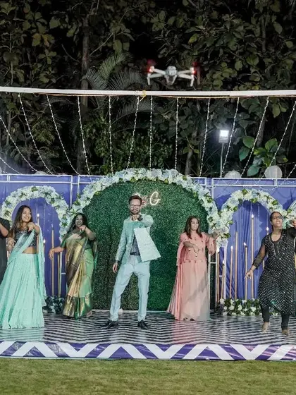 The friends' group interacting with the camera drone during their performance. We can incorporate fun elements like this to make the dance unique.