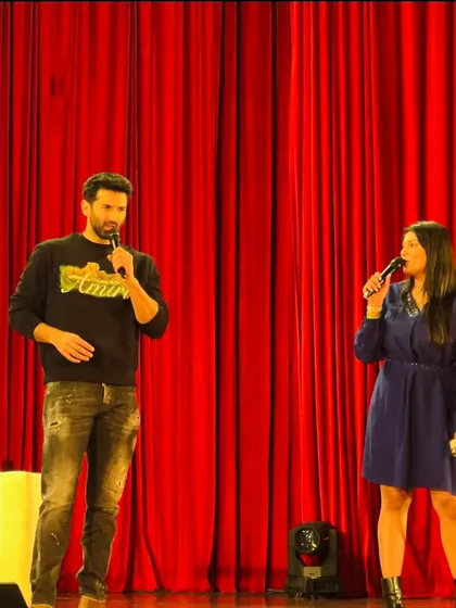 A moment on stage with Bollywood heartthrob Aditya Roy Kapur at IIT Bombay's Mood Indigo. I ensure a comfortable and engaging atmosphere for celebrity appearances.