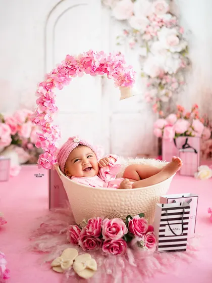 Having a blast in her floral bathtub! This baby's joyful expression is priceless.