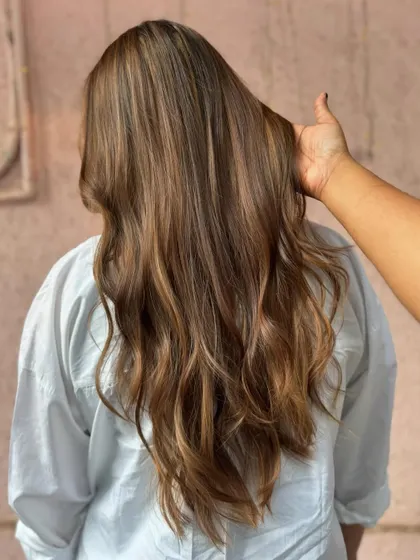 Showing off the seamless blend of this mochaccino color. The long, healthy hair looks absolutely stunning. (No filter)