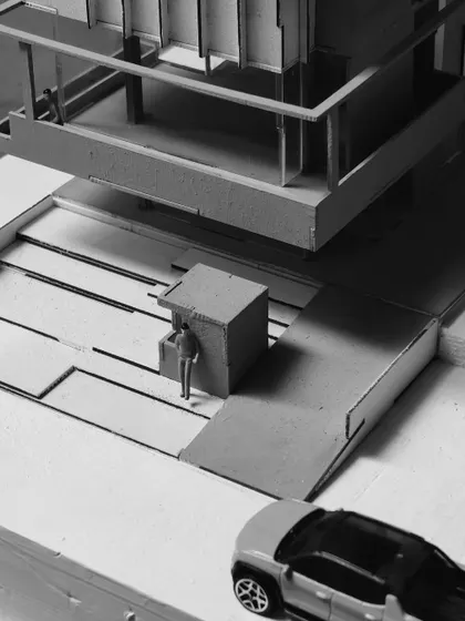 A detailed section of a physical model showing the relationship between different levels, ramps, and outdoor spaces. This tangible approach allows for a deeper understanding than a 2D drawing can offer.