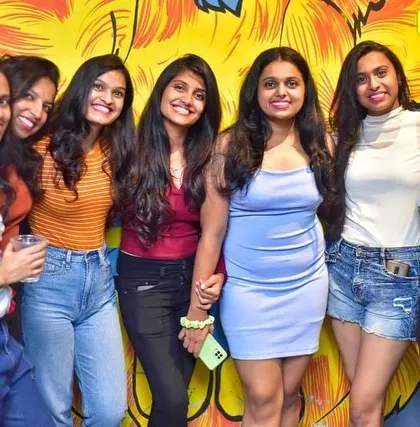 The ladies of Boomrang, all smiles and ready to dance the night away.