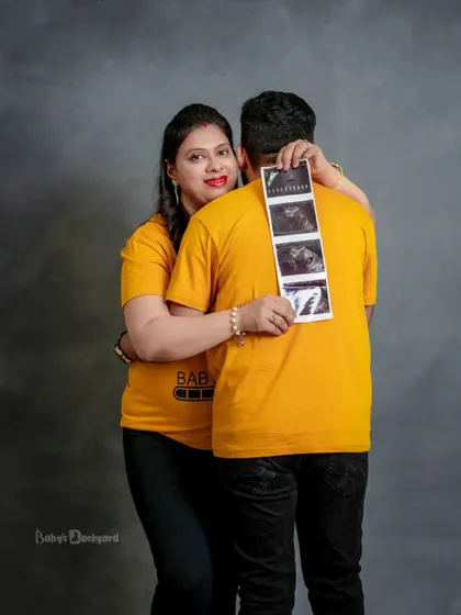The first family photo. We love incorporating your baby's ultrasound scan into your maternity shoot, celebrating the first glimpse of your little miracle.