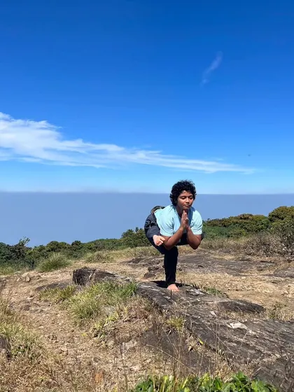 A balancing pose on a mountaintop. This picture is a symbol of my journey, finding stability and peace after a period of struggle. It was all worth it.
