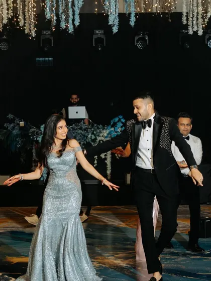 A candid shot of a couple enjoying their performance. My choreography is designed to flow naturally, so you can interact and share smiles on stage.