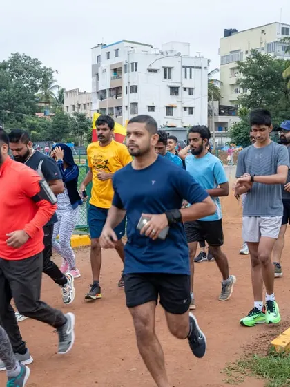 The group begins their run around Sarakki Lake, a scenic and motivating environment for training.
