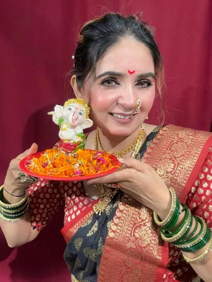 Another happy client ready for the Ganesh Chaturthi celebrations. The look is traditional, respectful, and beautiful.
