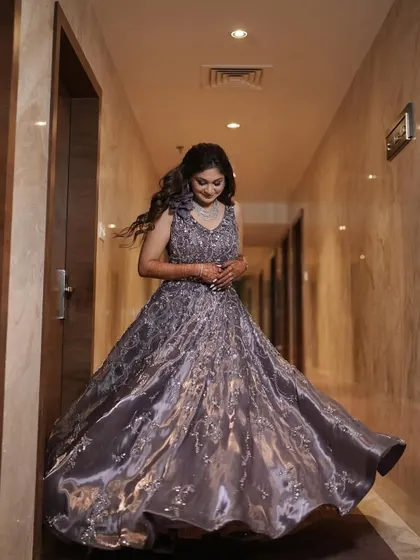A full-length shot of the dreamy lavender cocktail gown. The soft glam makeup with mauve shimmer lids perfectly complements the romantic feel of the dress.