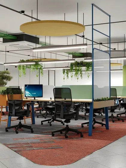 Creativity is at the heart of this workspace design. With hanging greenery, colorful acoustic panels, and flexible partitions, this area is built to inspire innovation and adapt to the team's needs.