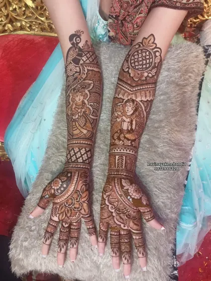 A beautiful bridal design featuring figures in traditional attire, topped with peacock motifs on the arms. The fine line work is a hallmark of my style.