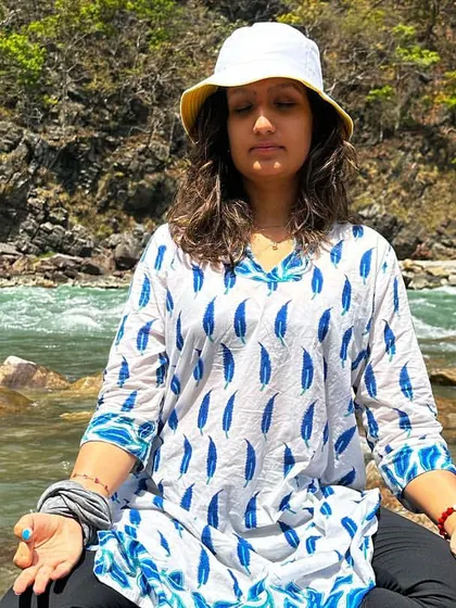 Meditating by the river at Phool Chatti Ashram in Rishikesh. The sound of the flowing water is the perfect soundtrack for finding inner peace.