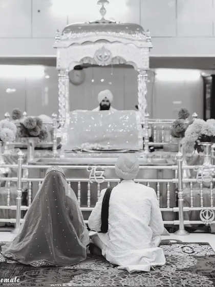 A serene moment of prayer at the Gurudwara. I respectfully capture the spiritual and traditional aspects of your union.