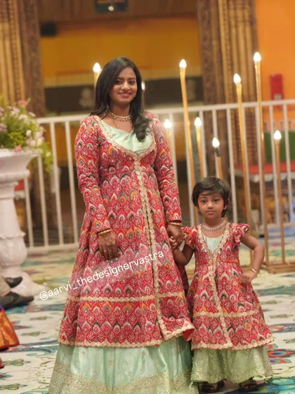 The love between a mother and daughter is forever. A beautiful moment with Tharuna and her daughter in matching jacket lehengas.