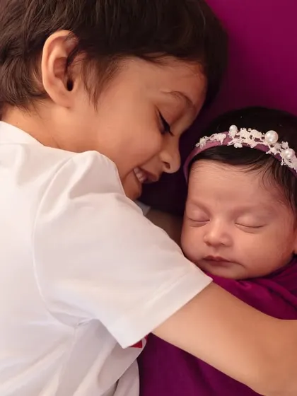 The sweet, protective embrace of a big brother meeting his newborn sister for the first time. These are the quiet, heartfelt moments between siblings that I feel so honored to capture.