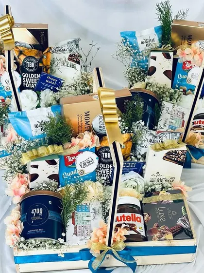 An overview of several luxury snack hampers, perfect for gifting to multiple family members or colleagues during the festive season.
