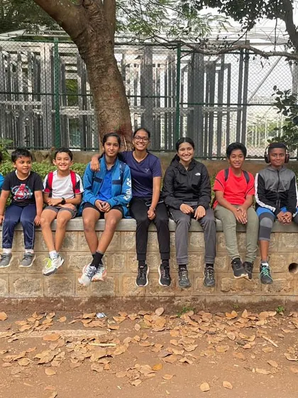 A moment of rest and camaraderie after a 10k run. Training together builds a strong team bond.