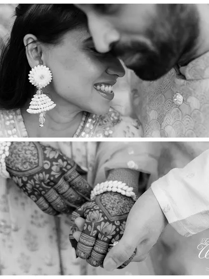 A beautiful black and white shot focusing on the couple's connection and the intricate details of the bride's henna.