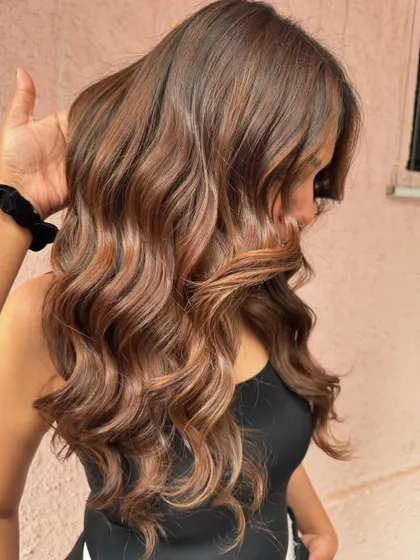 A side view of this gorgeous wedding hair. The soft curls and rich brown color are a match made in heaven. (No filter)