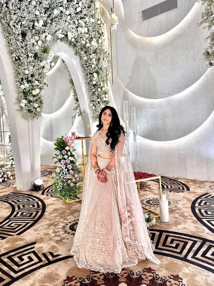 A full-length shot of Chahat at the event. The soft glam look was perfect against the beautiful floral decor.