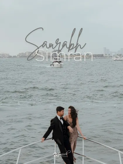 A beautifully styled portrait on the bow of the yacht, with their names elegantly scripted, perfect for a 'save the date'.