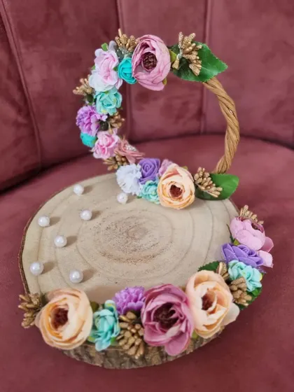 Another angle of the engagement ring platter, showcasing the handcrafted details of the floral arrangement.