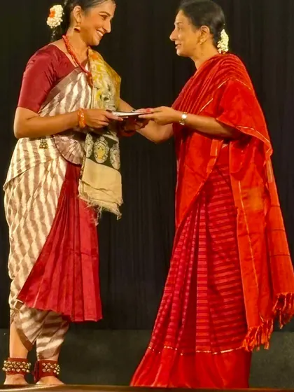 A cherished moment, receiving blessings on stage after the premiere. This performance was a significant milestone in my journey as a choreographer.
