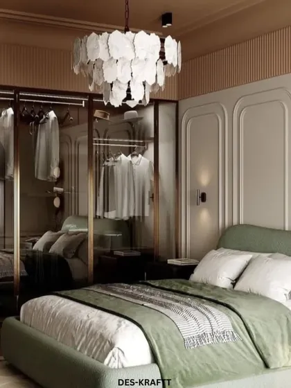 A look at the practical yet stylish glass-front wardrobe, which allows for easy organization while adding to the room's open and airy feel.