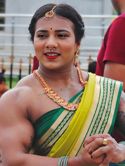 A candid moment during my outdoor shoot. It shows my relaxed but powerful presence, blending the worlds of traditional Indian culture and professional bodybuilding.