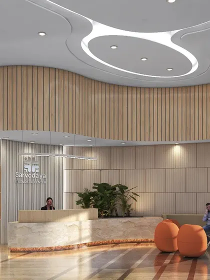 This rendering of a waiting area shows how muted colors, comfortable seating, and soft, decorative elements can create a more patient-friendly environment. The design aims to soften the clinical feel and create a sense of tranquility.