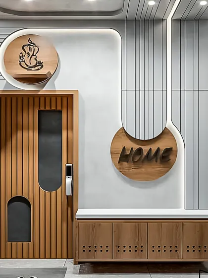 The foyer is the first impression of your home. I designed this entrance with a sleek shoe cabinet that includes a comfortable seating bench, combining modern aesthetics with practical, everyday utility.